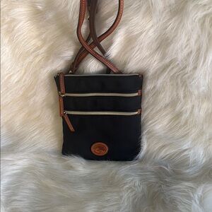 Dooney & Bourke Black and Brown Crossbody Bag with Sleek Design